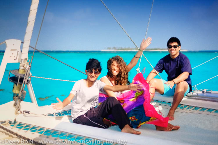Boon, Ali & Elaine on the trampoline of sailing catamaran Yemaya: This week has been an unforgettable experience